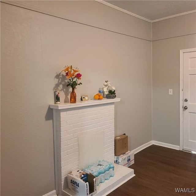 1923 18th Ave, Northport, AL 35476 - room details with ornamental molding, baseboards, and wood finished floors