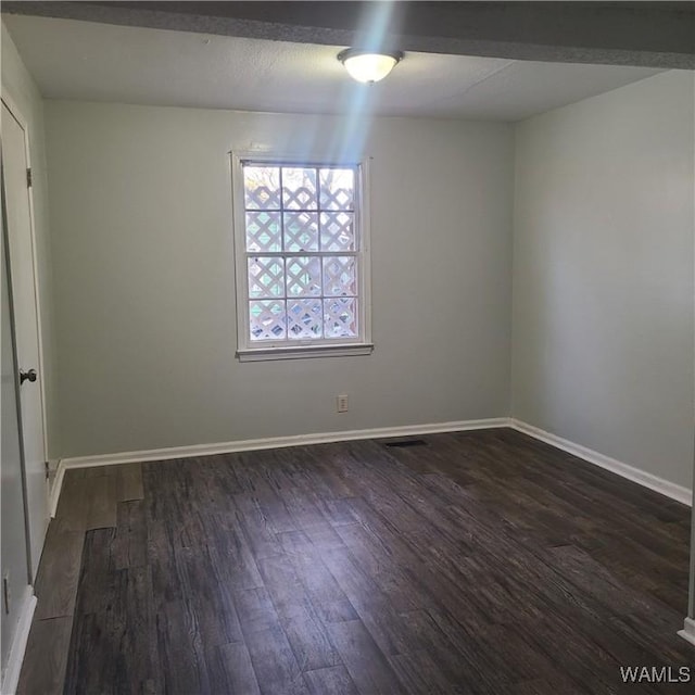 1923 18th Ave, Northport, AL 35476 - empty room with baseboards and wood finished floors