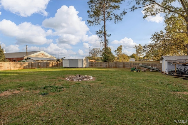 view of yard featuring a storage unit