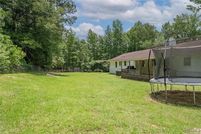 15120 Lakeland Forest Dr, Northport, AL 35475 - view of grassy yard featuring a trampoline and cooling unit
