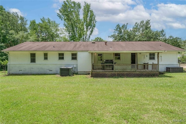 15120 Lakeland Forest Dr, Northport, AL 35475 - back of house featuring crawl space, central air condition unit, a lawn, and a deck