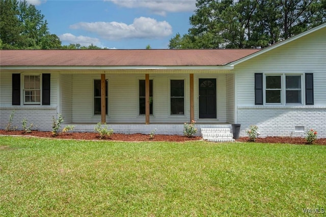 15120 Lakeland Forest Dr, Northport, AL 35475 - ranch-style home with brick siding, covered porch, crawl space, and a front yard
