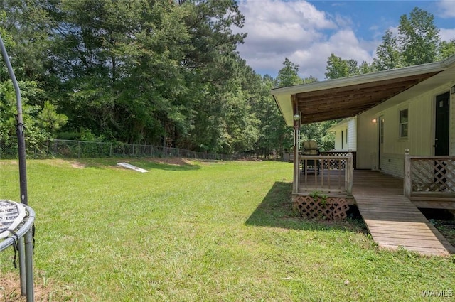 15120 Lakeland Forest Dr, Northport, AL 35475 - view of yard featuring a wooden deck and view of scattered trees