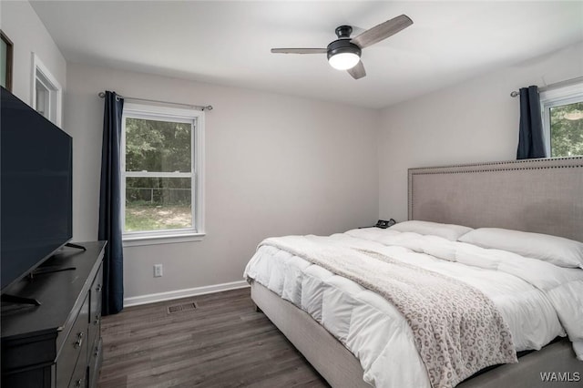 15120 Lakeland Forest Dr, Northport, AL 35475 - bedroom featuring dark wood-style floors, baseboards, and a ceiling fan