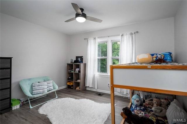 15120 Lakeland Forest Dr, Northport, AL 35475 - bedroom with wood finished floors, baseboards, and a ceiling fan