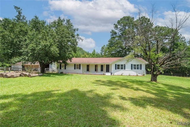 15120 Lakeland Forest Dr, Northport, AL 35475 - rear view of house featuring a lawn