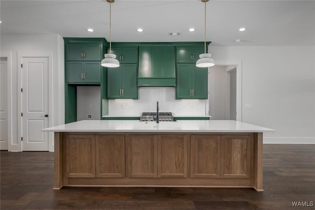 14817 Highpoint Cv, Northport, AL 35475 - kitchen featuring green cabinets, light countertops, dark wood-style flooring, extractor fan, and recessed lighting