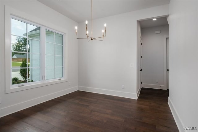 14817 Highpoint Cv, Northport, AL 35475 - empty room featuring a chandelier and dark wood-type flooring