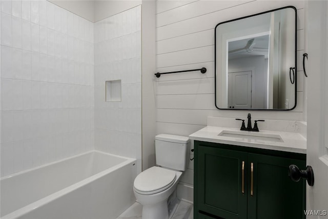 14817 Highpoint Cv, Northport, AL 35475 - bathroom featuring vanity, marble look tiles, and shower / tub combination