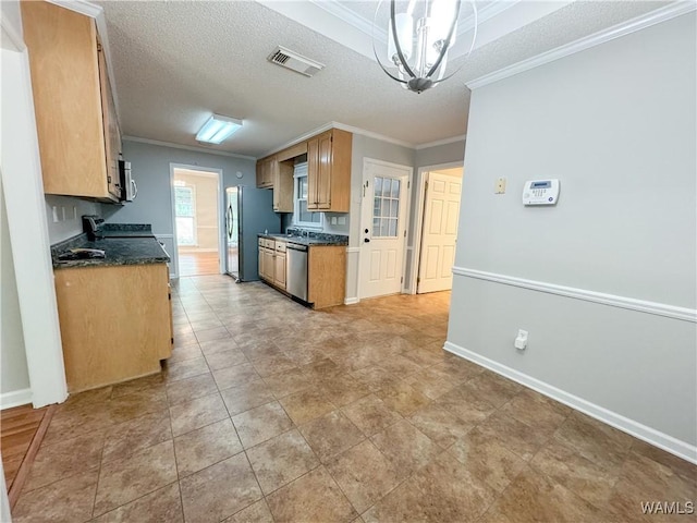 kitchen featuring hanging light fixtures, stainless steel appliances, a chandelier, a textured ceiling, and ornamental molding