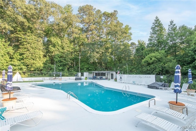 4809 Dove Creek Ave, Northport, AL 35473 - community pool featuring a patio