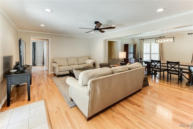 4809 Dove Creek Ave, Northport, AL 35473 - living room featuring ornamental molding, light wood-style floors, a ceiling fan, and recessed lighting