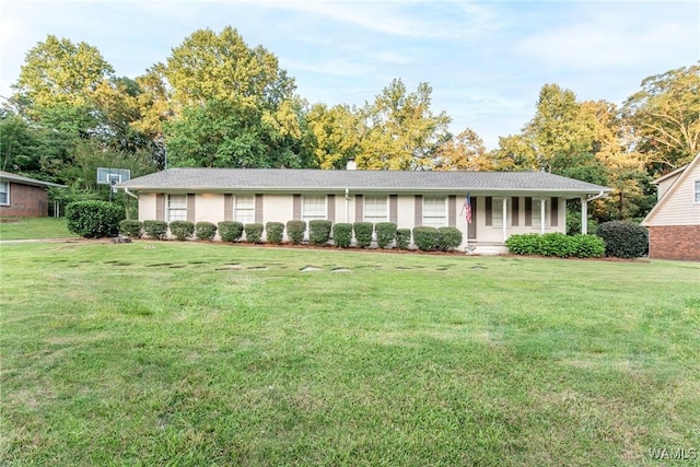 4809 Dove Creek Ave, Northport, AL 35473 - single story home featuring a front lawn and a chimney