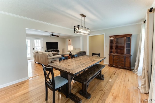 4809 Dove Creek Ave, Northport, AL 35473 - dining area featuring light wood-type flooring, crown molding, and ceiling fan