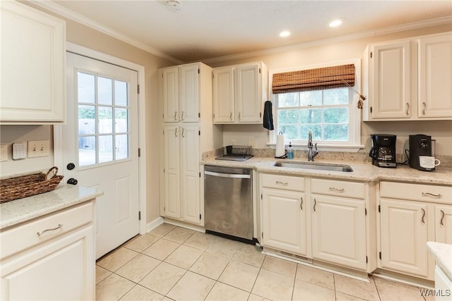 4809 Dove Creek Ave, Northport, AL 35473 - kitchen with stainless steel dishwasher, ornamental molding, light tile patterned floors, white cabinets, and light stone countertops