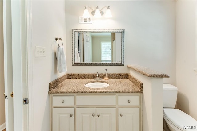 4809 Dove Creek Ave, Northport, AL 35473 - half bathroom featuring vanity and toilet