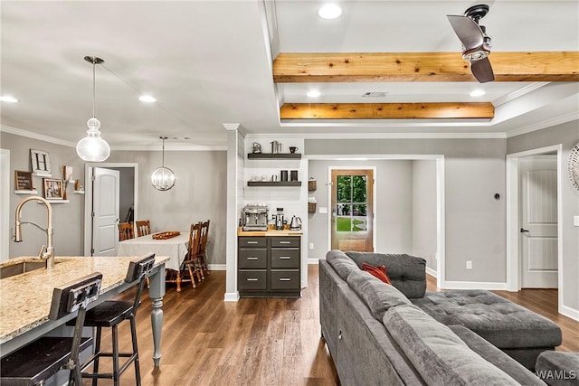 17631 Hayes Rd, Northport, AL 35475 - living room featuring ornamental molding, dark wood-style floors, recessed lighting, baseboards, and a chandelier