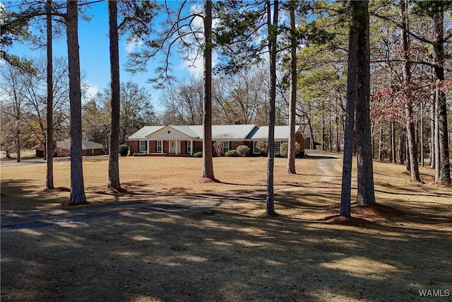 493 2nd St N, Centreville, AL 35042 - view of front of property featuring a carport and metal roof