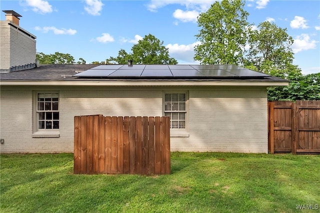 2507 Twin Mnr, Northport, AL 35476 - view of side of property featuring brick siding and solar panels