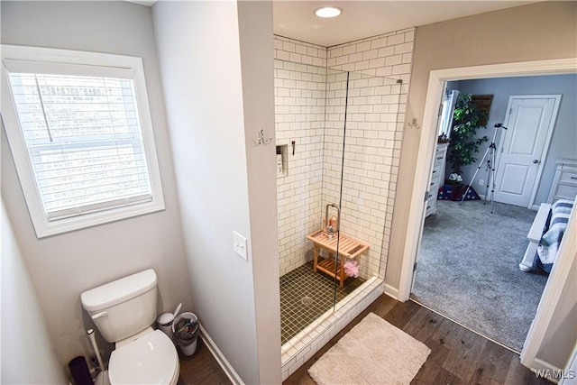 13946 Sullivan Blvd, Northport, AL 35475 - bathroom with a stall shower, wood finished floors, and recessed lighting