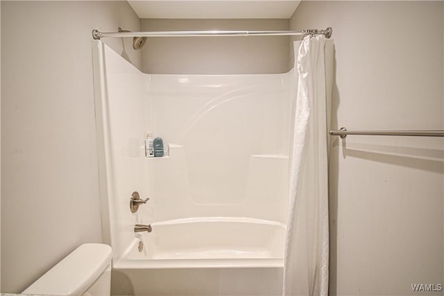 13946 Sullivan Blvd, Northport, AL 35475 - bathroom featuring toilet and shower / bathtub combination with curtain
