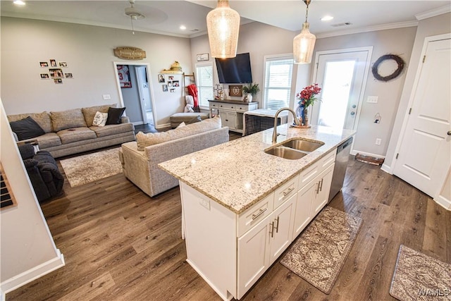13946 Sullivan Blvd, Northport, AL 35475 - kitchen featuring stainless steel dishwasher, ornamental molding, decorative light fixtures, white cabinetry, and dark wood finished floors