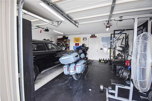 13946 Sullivan Blvd, Northport, AL 35475 - garage featuring a garage door opener