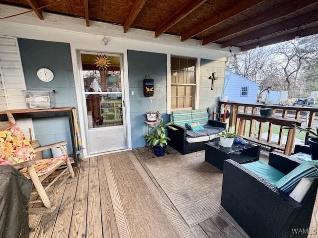 1002 Cedar Crest Dr, Demopolis, AL 36732 - wooden deck with outdoor lounge area