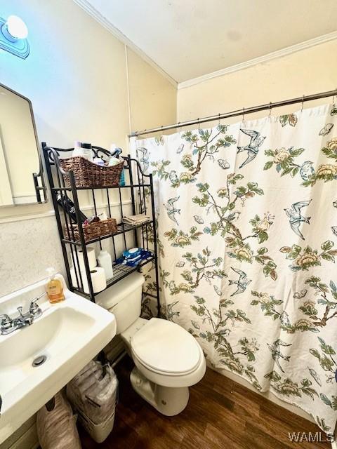 1002 Cedar Crest Dr, Demopolis, AL 36732 - full bathroom with crown molding, toilet, a sink, wood finished floors, and a shower with curtain