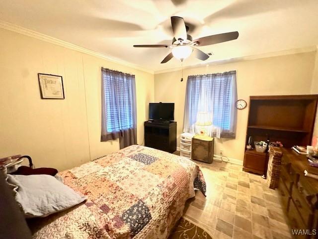 1002 Cedar Crest Dr, Demopolis, AL 36732 - bedroom with a ceiling fan and crown molding