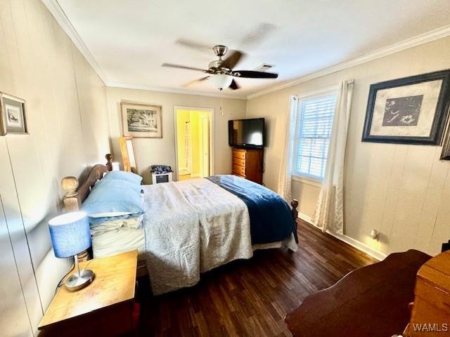 1002 Cedar Crest Dr, Demopolis, AL 36732 - bedroom featuring ornamental molding, a ceiling fan, and wood finished floors