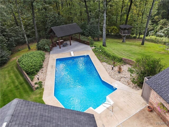 view of swimming pool with a gazebo, a patio area, a diving board, and a yard