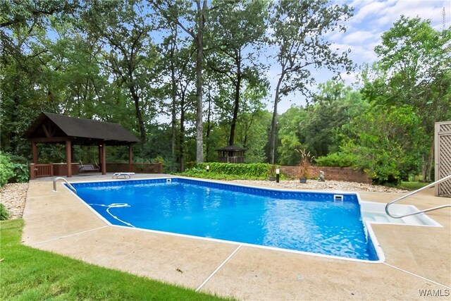 view of pool with a gazebo and a patio area