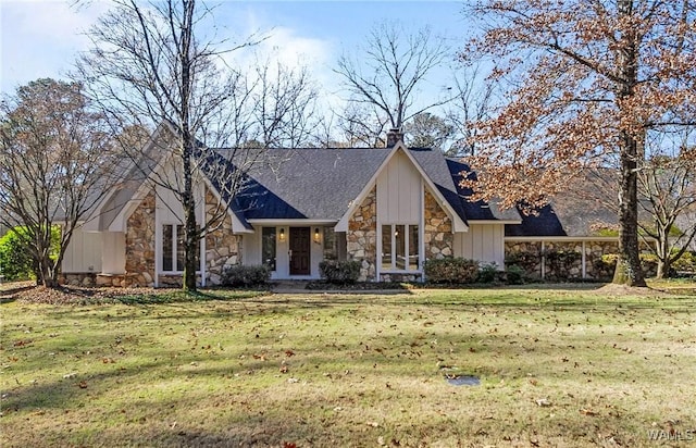 view of front of home featuring french doors and a front lawn