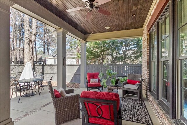 1006 Shady Tree Ln, Tuscaloosa, AL 35406 - view of patio featuring outdoor dining space, an outdoor living space, fence, and ceiling fan