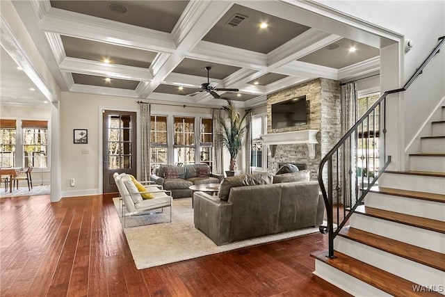 1006 Shady Tree Ln, Tuscaloosa, AL 35406 - living area featuring visible vents, stairs, a fireplace, ceiling fan, and dark wood-style floors