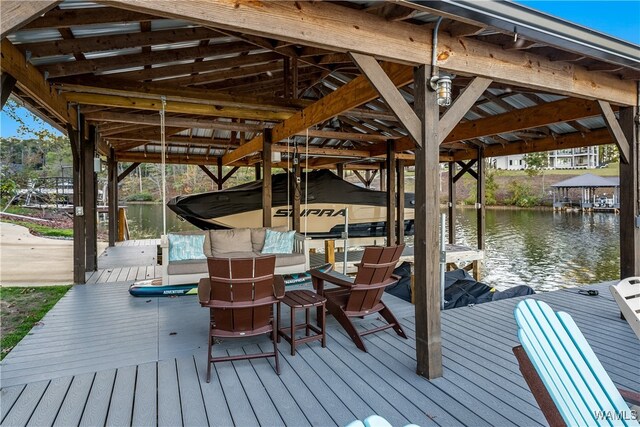 dock area featuring a water view