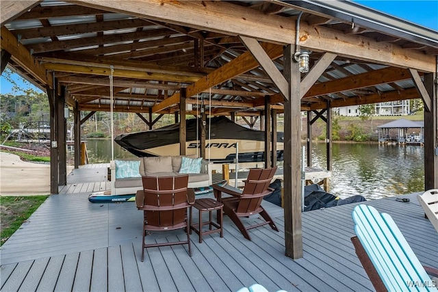 dock area with a water view