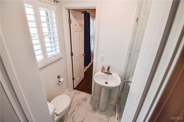 3207 33rd St, Northport, AL 35476 - full bath featuring baseboards, a stall shower, toilet, and marble finish floor