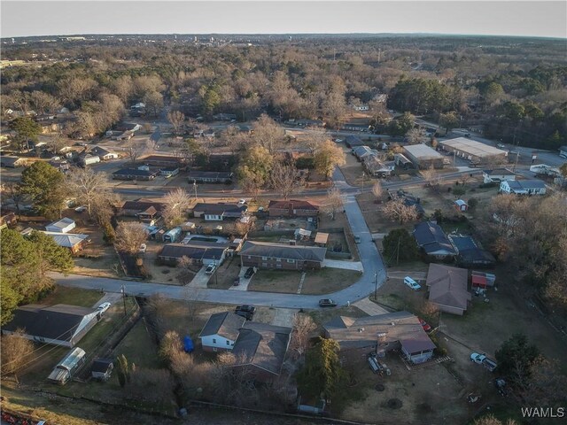 3207 33rd St, Northport, AL 35476 - drone / aerial view with a wooded view