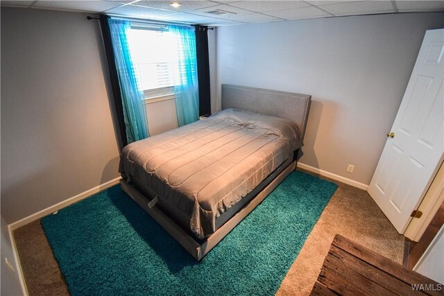 3207 33rd St, Northport, AL 35476 - carpeted bedroom with a paneled ceiling, visible vents, and baseboards