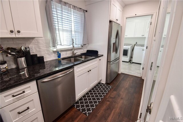 3207 33rd St, Northport, AL 35476 - kitchen with decorative backsplash, a sink, stainless steel appliances, and dark wood finished floors
