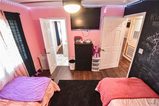 3207 33rd St, Northport, AL 35476 - bedroom with visible vents and wood finished floors