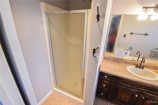 3207 33rd St, Northport, AL 35476 - full bath featuring a stall shower, tile patterned flooring, and vanity