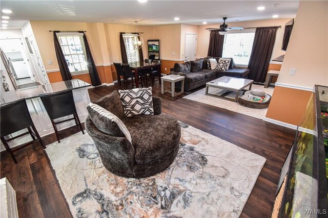 3207 33rd St, Northport, AL 35476 - living area with a ceiling fan, wood finished floors, plenty of natural light, and recessed lighting
