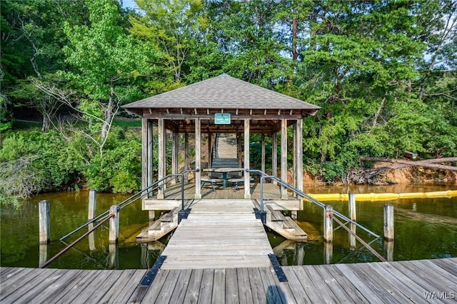 2940 Lake Crest Dr, Tuscaloosa, AL 35406 - dock featuring a water view, boat lift, and view of wooded area