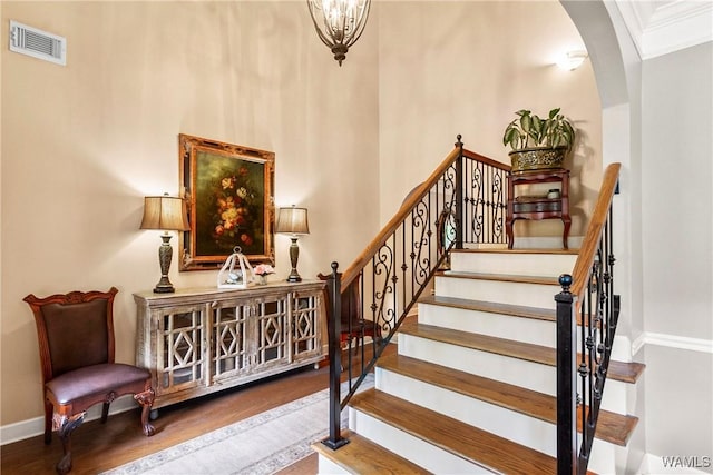 2940 Lake Crest Dr, Tuscaloosa, AL 35406 - stairway with arched walkways and wood finished floors