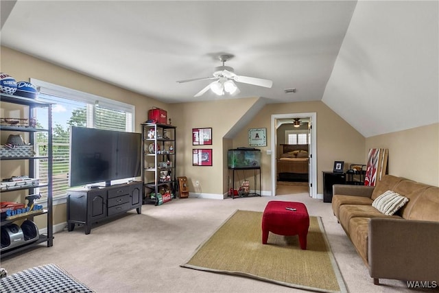 2940 Lake Crest Dr, Tuscaloosa, AL 35406 - carpeted living room with a ceiling fan, plenty of natural light, and lofted ceiling