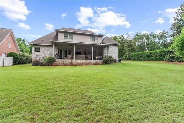 2940 Lake Crest Dr, Tuscaloosa, AL 35406 - rear view of property with a yard