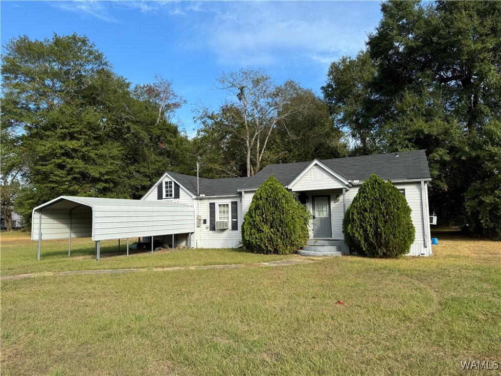 103 7th Ave E, Linden, AL 36748 - view of front of home with a carport and a front yard